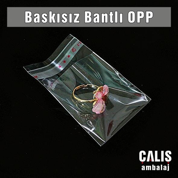 Küçük ebat baskısız bantlı OPP poşetin içinde hediyelik eşya paketlenmiş.