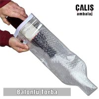 Özel kesim premium balonlu torbanın içinde şişe var.