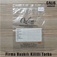 Özlem YEM firma baskılı kilitli torba. Şeffaf üzerine beyaz, siyah ve kırmızı olarak 3 renk baskı yapılmıştır.
