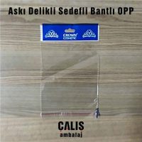 CROWN COSMETIC firma baskılı bantlı OPP torba. Askı delik kısmında beyaz sedef ve mavi renkli baskı mevcut.