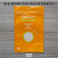 Luxenuts firma baskılı yuvarlak askı delikli özel üretim doypack. Kilitli ve açık ağız kısmında yırtma çentiği ile birlikte.