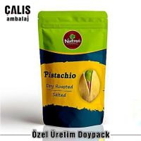 Özel üretim baskılı kuruyemiş doypack ambalajı, fıstık için tasarlanmış yeşil ve sarı renklerde.