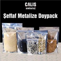 İçinde çeşitli ürünler olan şeffaf metalize doypack örnekleri